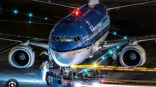 Towing a KLM Dreamliner from hangar to the gate