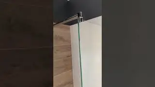 Стеклянная шторка в ванную комнату