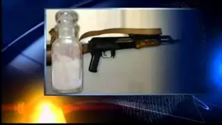 Drug raid nets guns, child abuse charges