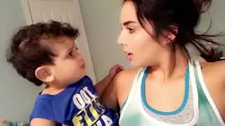 A cute boy kiss mom