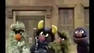 Grover speelt dwarsfluit