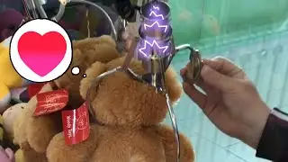 WON AT THE TOY MACHINE WITH THE HELP OF A BIG BEAR AND A SMART GINGER MAGNET)
