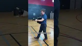 Singing jersey giant in a basketball gym