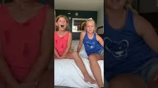 Girls first time to try Slime Lickers by Toxic Waste. (sour candy!!)