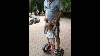 На гироскутере с внучкой