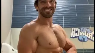 Nick flexes his muscles