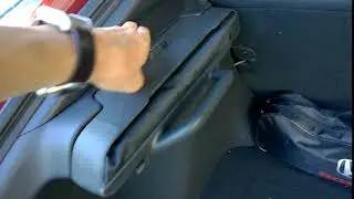 В новой Honda Civic Sport Plus багажная шторка складывается сумочкой. СтельмахProAuto
