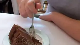 Emily eating cake with a fork!