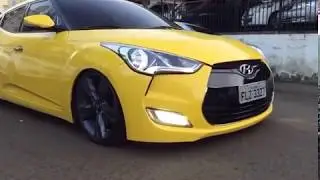 Veloster amarelo Brasil suspensao a ar