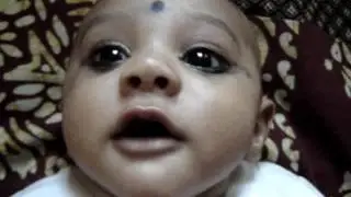 2 month old baby talking to dad