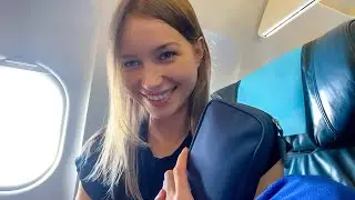 Olesya in business class. Flying to Milan.