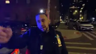 Ely is live! Cop watching thugs from the 33rd pct.