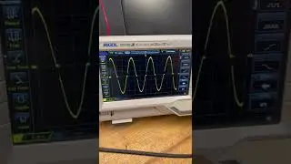SCR in a bridge rectifier circuit being phase shifted to control an AC sine wave