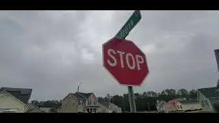 Street Signs Moving in the Wind Ahead of a Cold Front.
