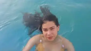 Pleasant posing underwater