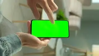 Tapping a smartphone screen green screen