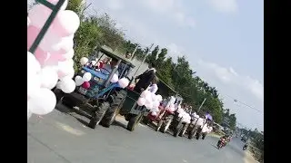 A procession by all the tractor in the wedding