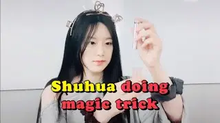 Shuhua doing magic trick with lip balm