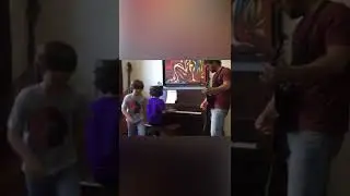 Kids and dad playing don't stop believin’ by Journey 