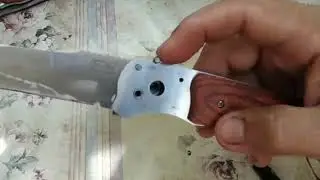 Предохранитель выкидного ножа.