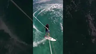 Guy Shows Amazing Trick By Flipping His Surfboard Mid Air While Kiteboarding