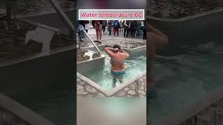 Bathing in cold water for baptism -7°C degrees Celsius in Ukraine, January 2022