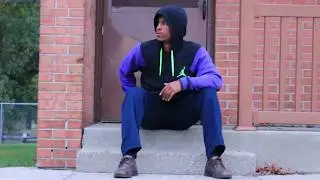 Free B Roll Footage: boy sitting on stoop in hoodie