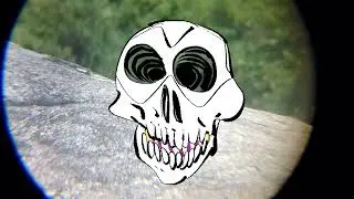 Skull folds itself to reveal inner three-eyed happy emoji. 