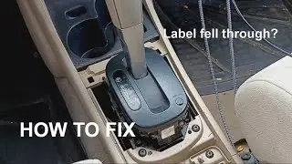 Shift stick indicator labels fell through 2009 Nissan Versa