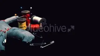 Stitched Voodoo Doll for Ritual on a Black Background with Threads and Needles | Stock Footage -