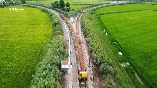 Locomotiva TAKARGO 1565 comboio de CARRIL