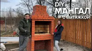 DIY brick barbecue with a hood