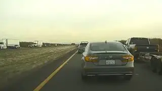 Impatient car weaving into fast lane dangerously close to hitting me