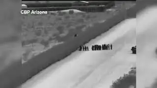 Migrants Defeat Border Wall, With a Ladder
