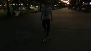 My friend is practicing his skateboard Tricks