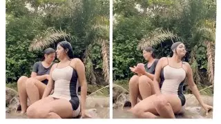 Andrea helping Yanina in the river | Granda Sister's Andrea Jennifer Granda Yanina 