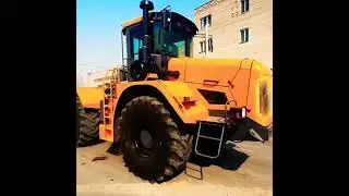 Трактор колёсный К704-4Р 《БАТР СК》, с гидрофицированным отвалом на трех точечной сельхос навески.