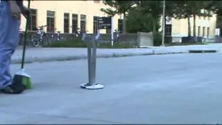 Bipedal Walking with a Compass Gait Robot