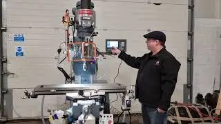 Bridgeport milling machine rebuilt with 4 axis dro and air draw bar.