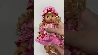 Красивая кукла пупсик в рюкзачке