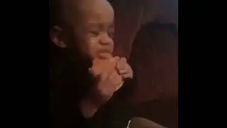 Kid Eating Burger while Crying and Listening to Juice World