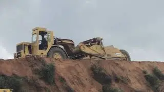 CAT Scrapers in Rough Grading Action!