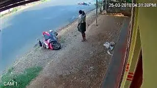 Car crashes the bike on CCTV