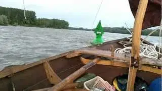 Man on the River, Passage close to a buoy, Danube river, Serbia