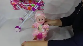 Кукла с коляской