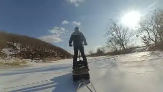 С сыном по озеру на Снежном коне.