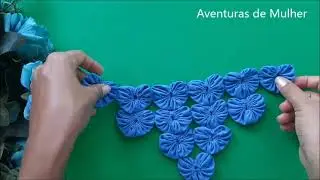 Table runner made with heart-shaped fabric flowers.