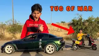 SPORTS CAR VS LIL BROTHER SCOTY TUG OF WAR