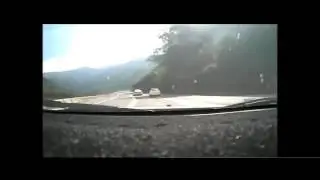 Speeding Yaris lost control while passing w  slow mo