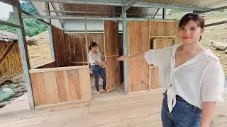 The girl has completed wooden walls, wooden doors and windows. The house floats on the water.